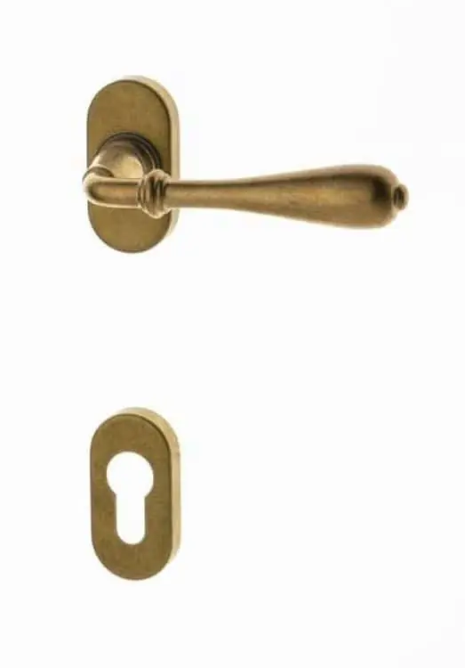 Maniglia Novecento Ghidini per porta interna, rosetta e bocchetta ovale foro Yale, quadro 8 mm, Ottone finitura Anticato Naturale Meest Verkocht