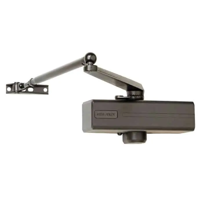 Chiudiporta aereo a cremagliera 564 Mab, per porta battente, forza di chiusura EN 2-5, braccio a V standard, finitura Bronzo Gratis Retour